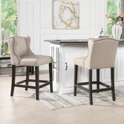 Suzie 39.75 in. Desert Beige Shelter Wingback Rubber Wood 27 in. Counter-Height Barstool with Polyester Seat by Jennifer Taylor -Jennifer Taylor Home Store desert beige yarndye jennifer taylor bar stools 81102 mpb 31 1000