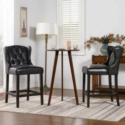 Richmond 39.5 in. Vintage Black Brown Tufted Wingback Oak Wood 27 in. Counter Height Bar Stool with Faux Leather Seat by Jennifer Taylor -Jennifer Taylor Home Store vintage black brown faux leather jennifer taylor bar stools 81101 mfb 31 1000