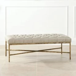 Aerin Warm Gray Faux Leather Hammered Gold Tufted Cocktail Ottoman 25 in. x 48.5 in. x 17.5 in. by Jennifer Taylor -Jennifer Taylor Home Store warm gray faux leather jennifer taylor bedroom benches 85730 mfl 40 1000